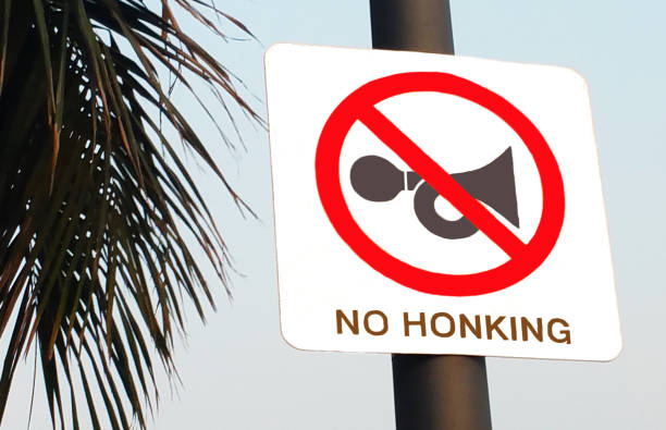 No Honking - No Horn sign board on a road in India No Honking - No Horn sign board on a road put by traffic police in India social awareness symbol audio stock pictures, royalty-free photos & images