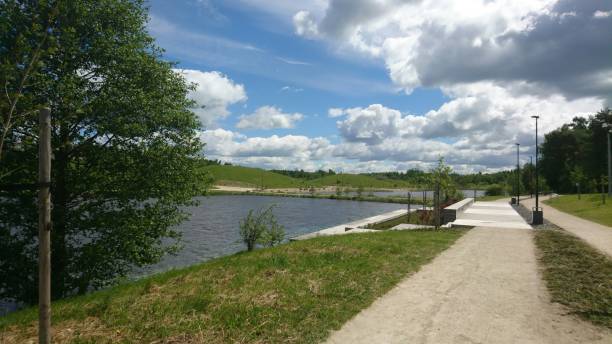 istock Landscape with path in square near lake 692270268