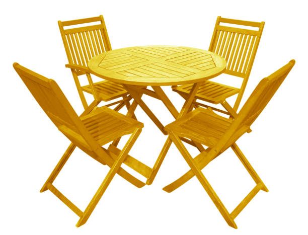 istock Wooden table and chairs - yellow 692274252