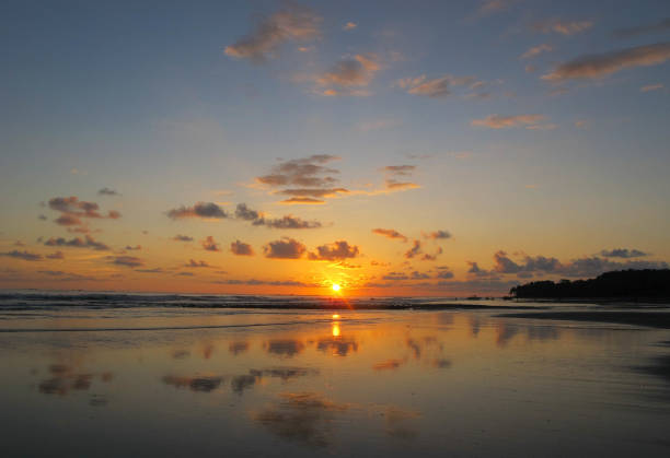 istock Sunset and cloudscape, Playa Uvita, Costa Rica 692282512