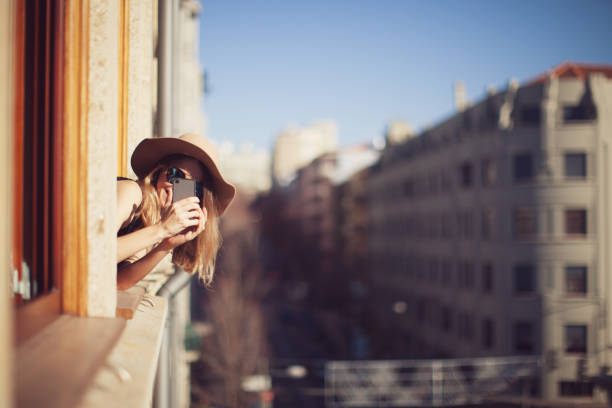 istock Young woman uses smartphone 692285738