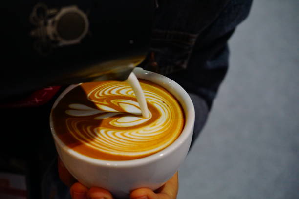 istock Pouring latte art into the cup 692288964