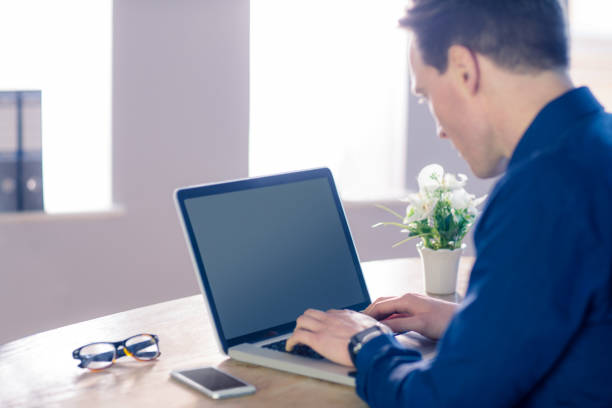 istock Businessman typing on his laptop 692289488