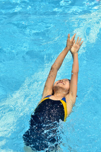 Girl swimming in pool