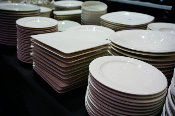 istock Several stacks of white porcelain plates 692306686