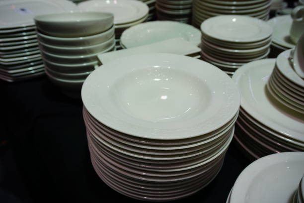 istock Several stacks of white porcelain plates 692306698
