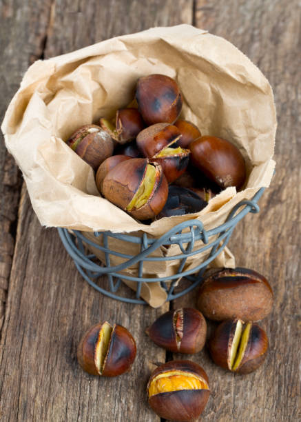 istock roasted chestnuts on wooden surface 692306724