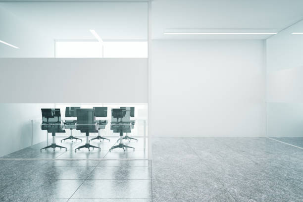 istock Meeting room with blank wall 692307178