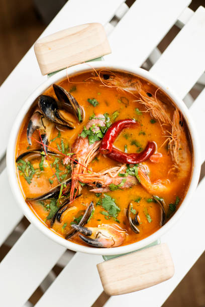 mixed fresh creamy spicy seafood chowder soup bowl