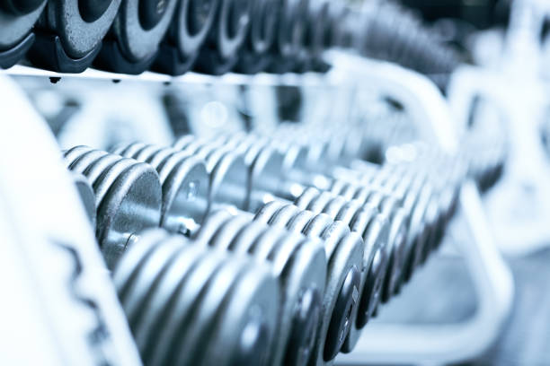 istock Dumbbells in gym 692316284