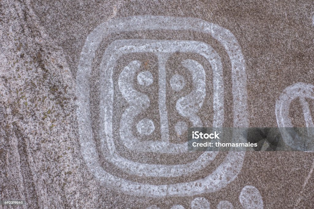 Swedish Petroglyphs  square Petroglyph dating back about 4000 years, near Nyköping, Sweden Abstract Stock Photo
