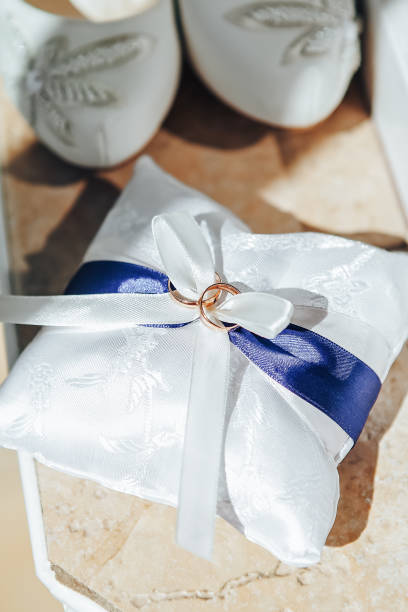 istock Wedding Rings and Bride Shoes 692357552