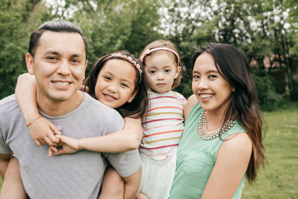 istock Happy family having fun outdoor 692360124