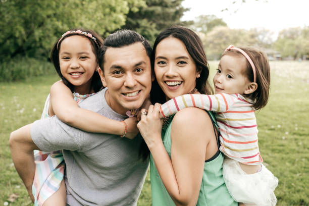istock Happy family having fun outdoor 692362228