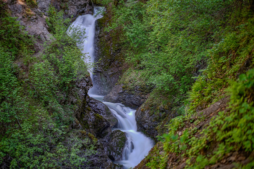 Images of Thunderbird Falls, a 100 foot waterfall in the Chugach National Forest