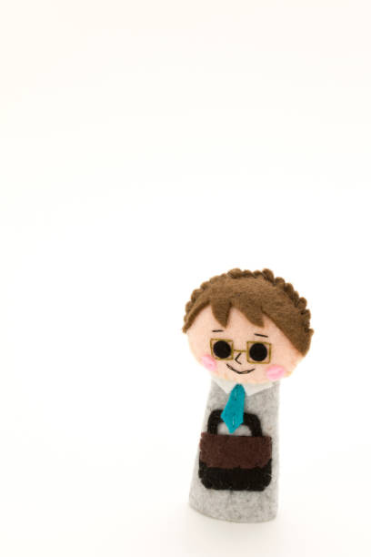istock Puppet of a smiling businessman 692365094