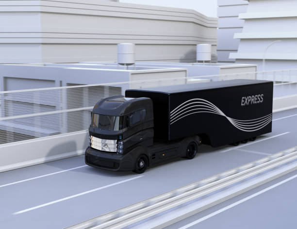 istock Black autonomous truck driving on highway 692365842