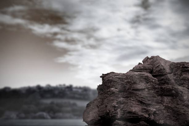 istock Large rock overlooking foggy forest 692370604