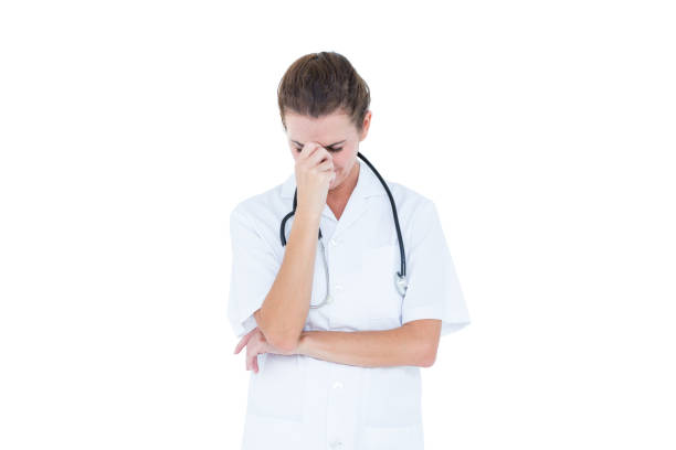 istock brunette female doctor 692376000