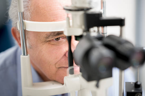 istock Patient getting an eye exam at the optician 692381768