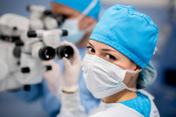 Portrait of a surgeon in the operating room at the hospital Portrait of a surgeon in the operating room at the hospital and looking at the camera - healthcare and medicine eye surgery photos stock pictures, royalty-free photos & images