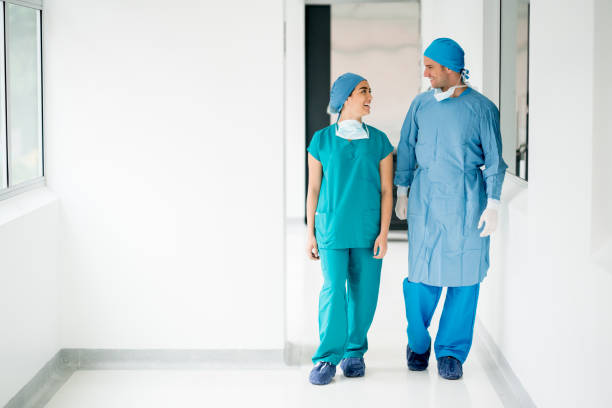 istock Surgical team getting ready for surgery at the hospital 692381892