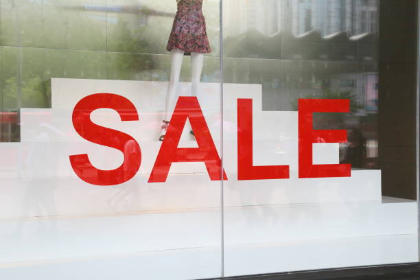 istock sale sign on store window 692397368