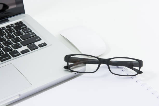 istock Blank business laptop, mouse, pen 692403340