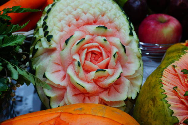 istock Thai fruit carving, watermelon carving to flower 692406988
