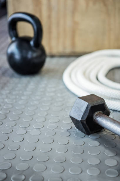 istock Close up view of excercise equipment on the floor 692409050
