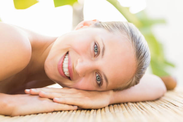 istock Attractive woman getting massage on her back 692415634