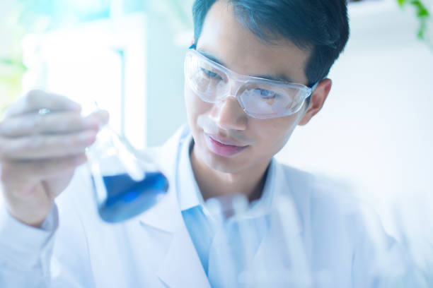istock Scientists Looking at a Test Tube 692416096