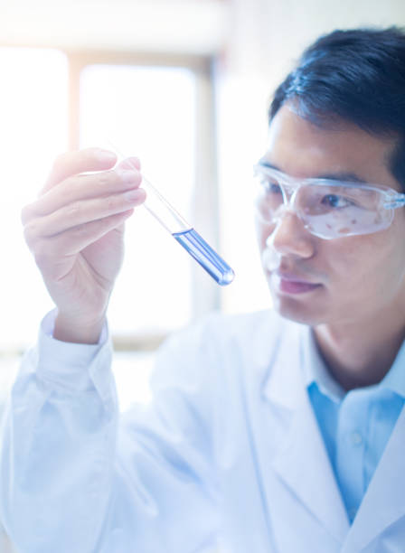 istock Scientists Looking at a Test Tube 692416140