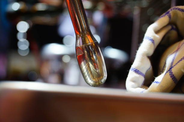 tube with steaming milk in cafe , espresso machine,