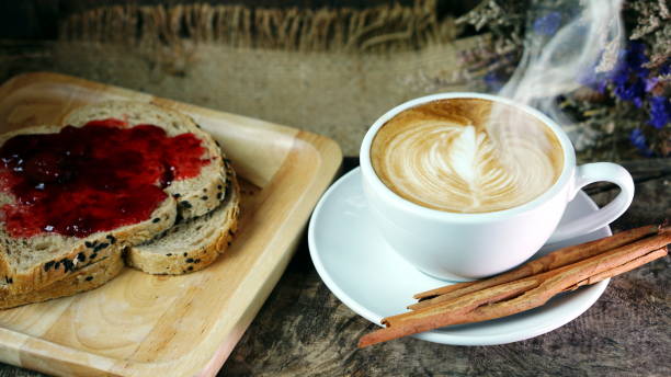 istock Leaf of Latte art and cappuccino coffee with cinnamon 692422656