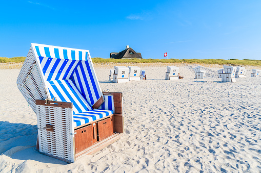 Vacations on the Baltic Sea. Beach chairs are ready for the guests for the coming summer season.