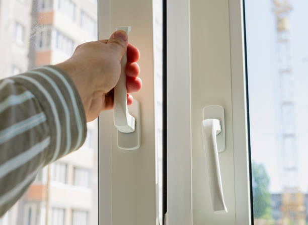 istock The man's hand opens the window. Ventilating a house in hot weather. 692438520