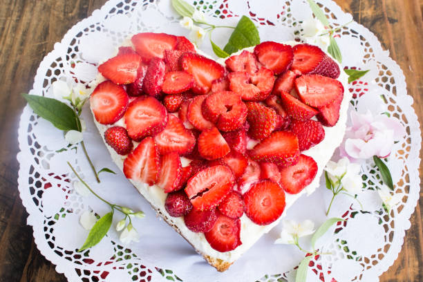 istock Heart Cheesecake with Strawberries 692438656