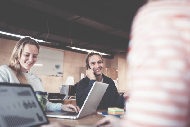 istock Young business people working together in the office 692442188