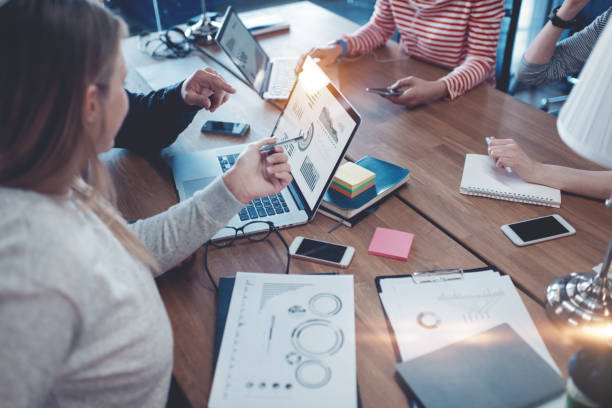 istock Young business people working together in the office 692442214