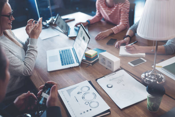 istock Young business people working together in the office 692442268