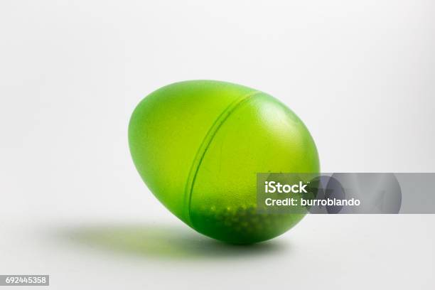 Transparent Green Egg Shaker With Beads Inside Stock Photo - Download Image Now - Arts Culture and Entertainment, Australia, Bright