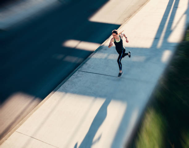 istock Woman jogging in the city 692446070