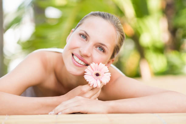 istock Attractive woman getting massage on her back 692451902