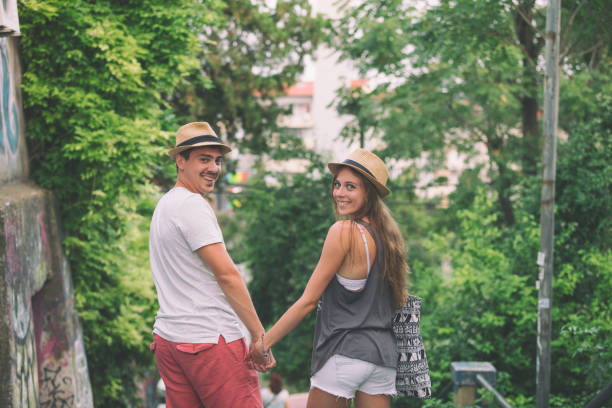 istock Couple in love holding hands. 692452402