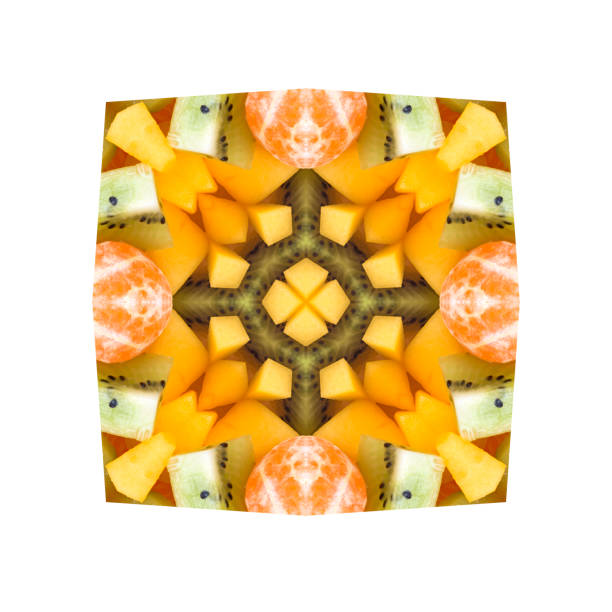 istock Abstract ornamental pattern from sweet fruits on white background 692453104