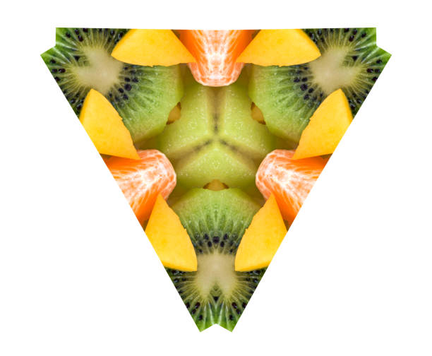 istock Abstract ornamental pattern from sweet fruits on white background 692455482