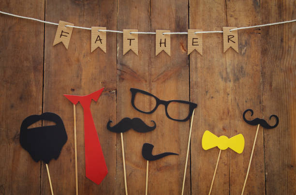 istock funny beard, glasses, mustache, tie and bow. Father's day concept 692458646
