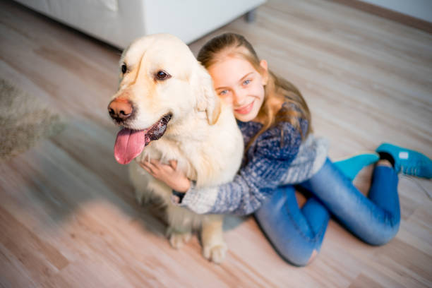 istock Girl with her dog 692459346