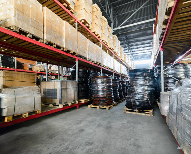 istock Long shelves with a variety of boxes and containers 692461620